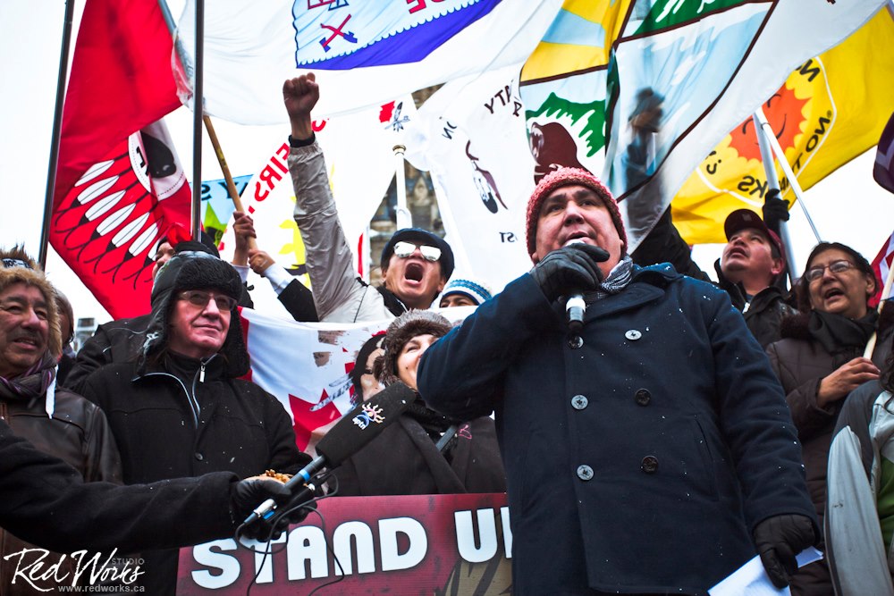 Clayton Thomas Muller speaks at Idle No More Rally