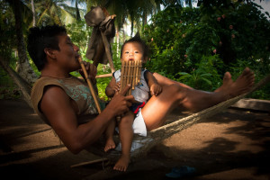Reclining in his hammock and fiddling with his handmade flute, Santiago Campillo, the leader of Armila's folk music group Gammibe Gun Galu, explains: The songs we play are the songs God taught to each animal so that they could greet him with music when he visited mother earth.” This rhythmic, soothing music he references, reminiscent of singing birds and lumbering tapirs (a cuddly-looking relative of the rhino), embodies the spirit of the Guna culture.