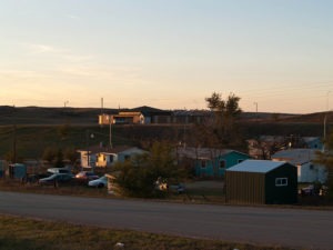 Photo by Andrew Filer - Activists from North Dakota's reservation town of Mandaree, which is mostly poor, say none of the oil money collected by either the tribe or the state of North Dakota comes back to their town.
