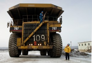 Heavy equipment operators at an oil sands mine near Fort McMurray, Alberta, Canada. Photo Credit: Jerry Cleveland / The Denver Post