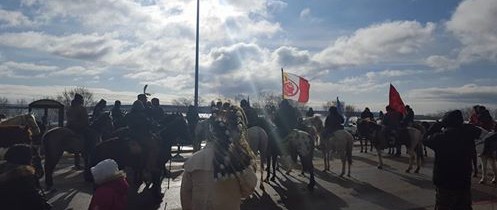 Warriors from the Oceti Sakowin prepare to travel to Spirit Camp. Photo by Waniya Locke